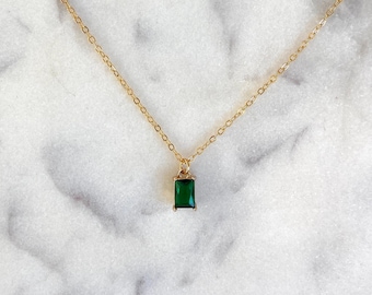 Gold chain on sale with green pendant