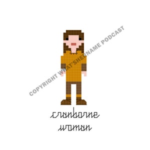 以下が含まれることがあります： 茶色の髪の毛をした人が、黄色のチュニックと茶色のズボンを履いているピクセルアートのイラスト。画像の下に「Cranborne Woman」というテキストがあります。