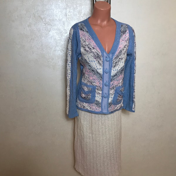 Blue knitted womans sweater with button up front, pink--blue-white front, two pockets, V-neck Medium size