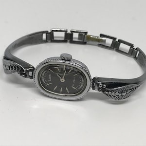 Vintage 90s women's watch, silver color, bracelet clasp, metalic wristwatch, oval shape, Belarus watch, Luch