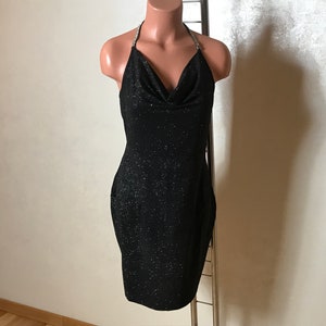 Black vintage dress, halter top dress, shimmering glossy fabric, small medium size, short length, sheath design, evening coctail dress