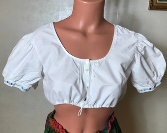 Vintage topcollectie: Dirndl crop tops, wollen paisley shirt, linnen polo, T-shirt met print. Maten S-L