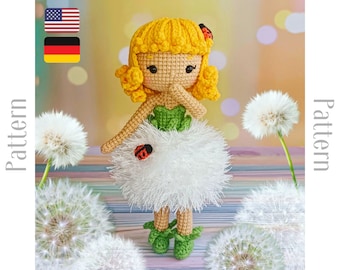 May include: Crochet amigurumi doll with yellow hair, green dress, and white fluffy skirt. The doll is holding a ladybug and is surrounded by dandelions.