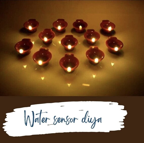 12 Water Sensor Eco friendly Led Diyas Candle Warm Orange Ambient