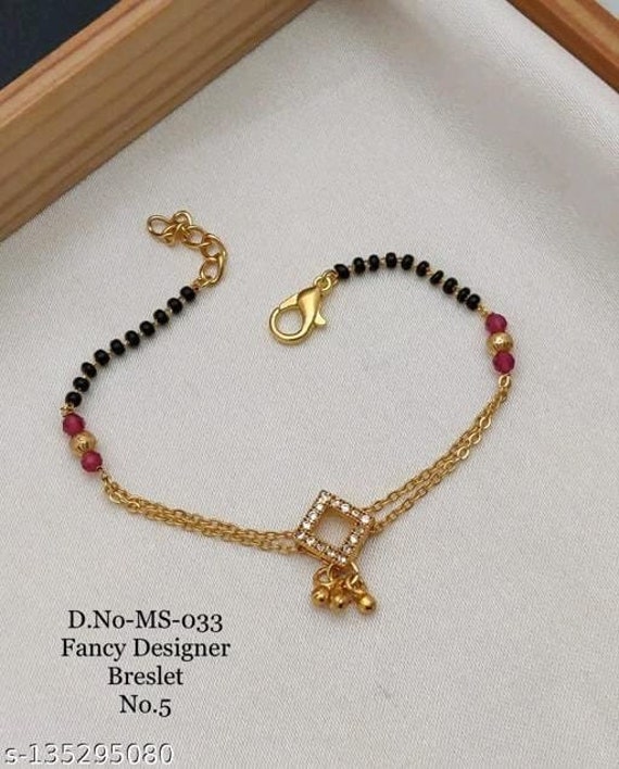 Crystal Charms Ball Slider Expandable Hand Wrist Mangalsutra Bracelet at Rs  120 | ब्रेसलेट - AANYA LIFESTYLE, Mumbai | ID: 27166042455