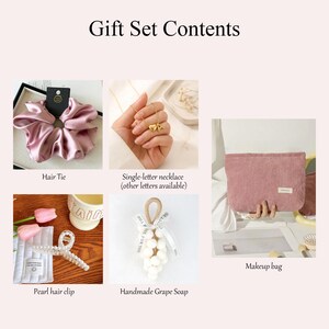 May include: A gift set with a pink satin hair tie, a single-letter necklace, a pearl hair clip, a handmade grape soap, and a pink corduroy makeup bag. The text "Gift Set Contents" is at the top.
