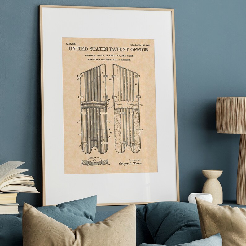 May include: A vintage patent drawing for a hockey goalie leg guard. The drawing shows a side view of the leg guard, which is made of multiple layers of material. The patent number 1,384,302 and the date May 20, 1924 are visible at the top of the drawing. The text "UNITED STATES PATENT OFFICE" is also visible.