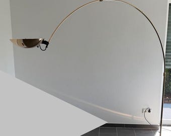 Arc floor lamps. Leonardo Marelli for Spanish brand Estiluz.