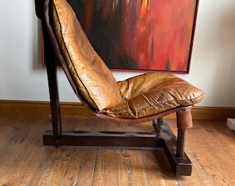 Brazilian brutalist Tripod Lounge Chair, 1960s. Camel leather