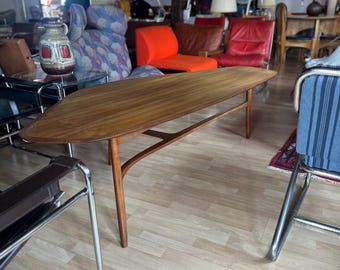 Svante Skogh for Laauser large curved coffee table. 1950's. Walnut