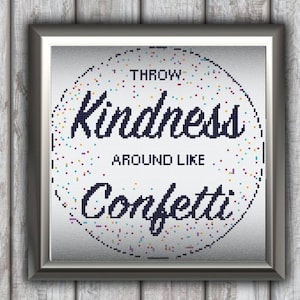 May include: A framed print with a white background and a black circle in the center. The circle has colorful confetti and the text "Throw Kindness Around Like Confetti" in black.