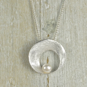 sterling silver necklace with a pearl image 1