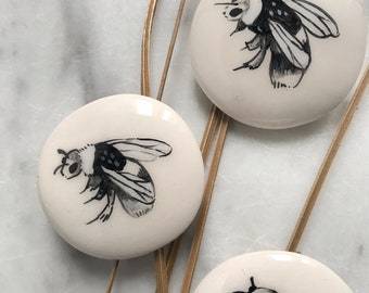 Ceramic Broach with illustrated Bee