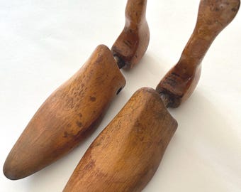 Hinged wooden shoe trees or stretchers