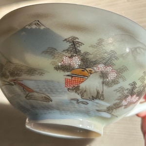 Japanese fine porcelain hand painted cup and saucer