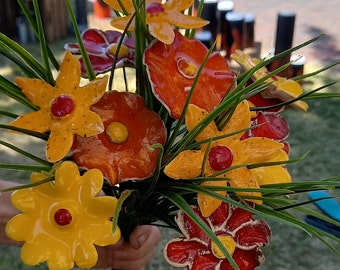 12 ceramic flowers red/yellow/orange mix