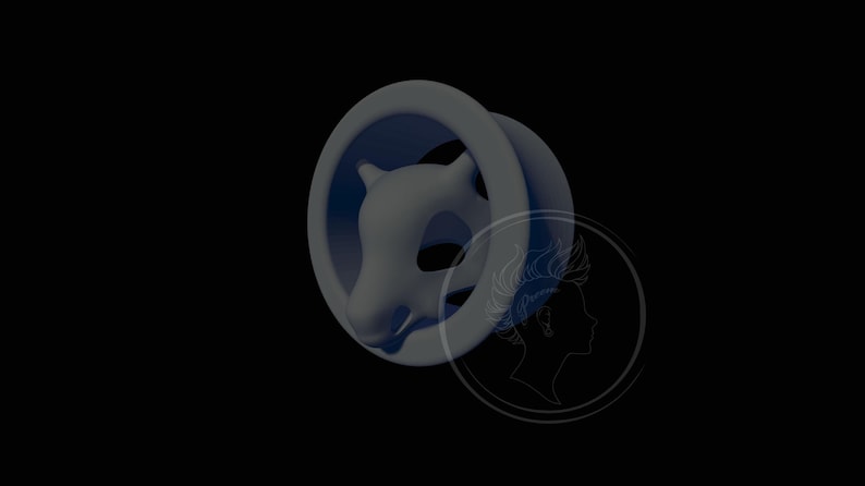 May include: A gray and blue circular ear gauge with a 3D sculpted animal head design. The animal head is facing forward with its mouth closed. The ear gauge is made of a smooth, matte material.