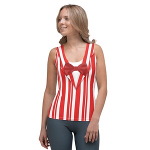 May include: A red and white striped tank top with a black bow tie. The tank top has a tuxedo-style design.