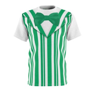 May include: White t-shirt with a green and white striped pattern that resembles a tuxedo vest. The shirt has a green bow tie.