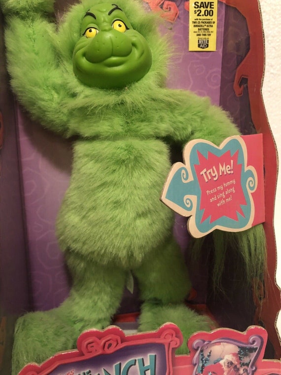 Universal - Film de jouet de poupée peluche de Grinch autour du