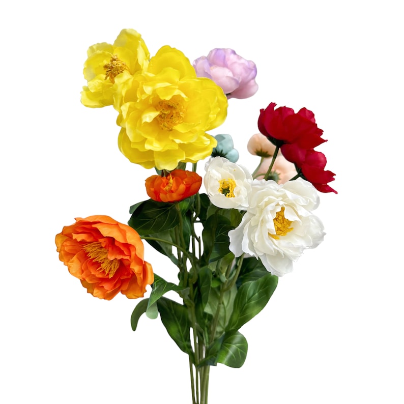 May include: A bouquet of artificial flowers in various colors, including yellow, orange, red, white, and pink. The flowers are arranged in a cluster and have green leaves.