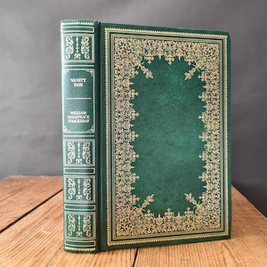 La feria de las vanidades de William Makepeace Thackeray, edición decorativa en piel sintética de Guild Publishing, libro de tapa dura de La feria de las vanidades