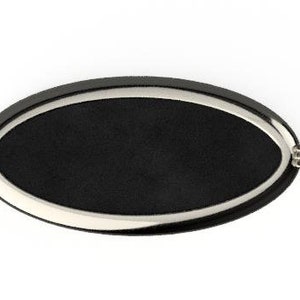 May include: A black oval-shaped key chain with a silver metal rim and a silver metal loop.