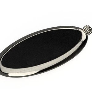 May include: A black oval-shaped pendant with a silver rim and a silver loop at the top.