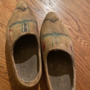 Antique Bavarian wooden clogs late 1800’s paint remnants on top. Part of a historic Missouri property.