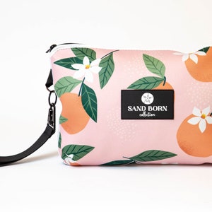Wasserdichte alle Neopren-Kosmetiktasche, sanddichte IT FLOATS-Reißverschlusstasche, die sich perfekt für den Pool am Strand eignet, Zwei Größen erhältlich