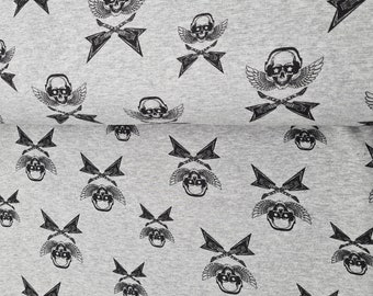 Cuddly alpine fleece grey mottled with skulls and guitars