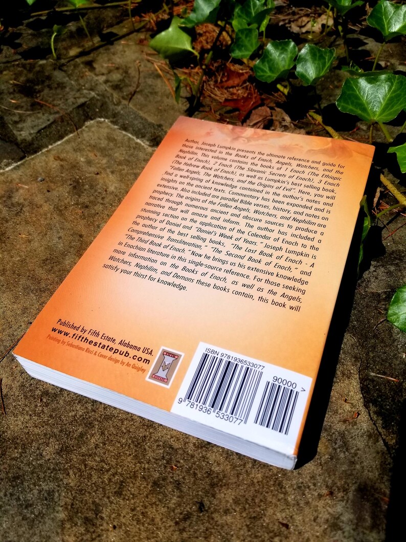 May include: The back cover of a book titled "The Lost Book of Enoch - A Comprehensive Transliteration" by Joseph Lumpkin. The book is orange and features a barcode and ISBN number. The text on the back cover describes the book as a reference guide for those interested in the Books of Enoch, Angels, Watchers, and the Nephilim.