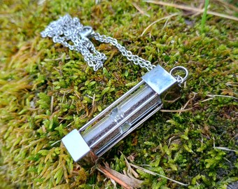 Hourglass Charm, 5000 year Irish Bog Oak Dust.