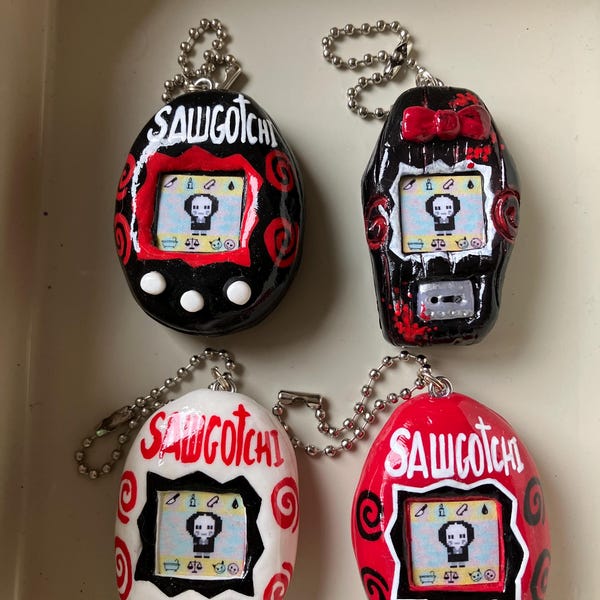 SAW TamaGoth (not real) keychain/bag jewelry, handmade horror movie, Jigsaw, Sawgotchi, 90's pixel art, sculpture