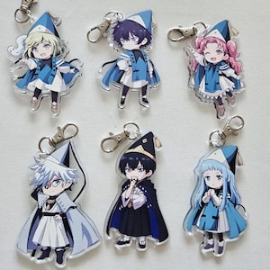 May include: Six acrylic keychains featuring chibi-style anime characters dressed in blue and white wizard-inspired outfits with pointed hats. Each charm includes a silver-toned metal lobster clasp attached to the top for hanging or securing to items.