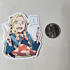May include: A sticker featuring a cartoon illustration of a female elf character with blonde hair, wearing a blue and white outfit, holding a knife and a fork. The character is standing in front of a red mushroom. The sticker has a speech bubble with a question mark in it.
