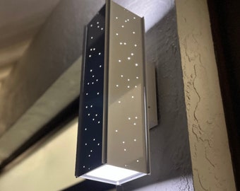 The RadiantLight Peek-a-Boo Up and Down Light: Wall Sconce is a Midcentury, Modern, Contemporary, Retro Designed LED Landscape Light