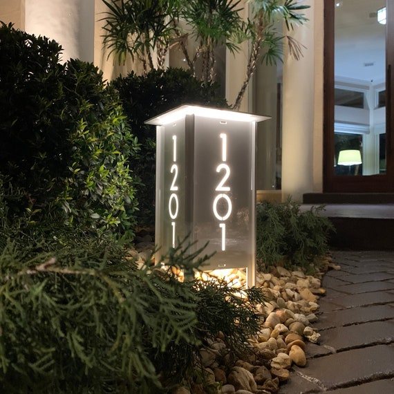 The Radiantlight ADDRESS MARKER is a Midcentury Modern