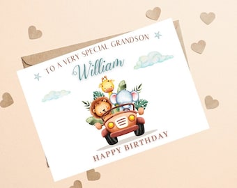 May include: A white card with a blue and white cloud design. The card says "To a very special grandson William" and "Happy Birthday". There is a cartoon image of a red jeep with a lion, elephant, and giraffe inside.