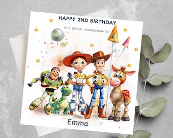 May include: A birthday card featuring characters from the Toy Story movie. The card reads "Happy 2nd Birthday to a special granddaughter" and includes the name "Emma". The card features Buzz Lightyear, Woody, Jessie, Rex, and Bullseye.