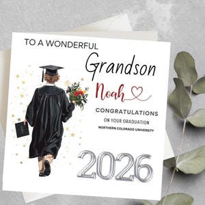 May include: A graduation card with the text "To a Wonderful Grandson Noah, Congratulations on Your Graduation, Northern Colorado University, 2026." The card features an illustration of a graduate in a cap and gown.