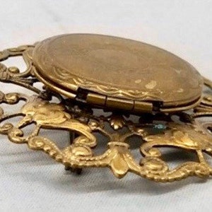 ANTIQUE gold filled brooch, doubles as a locket, lovely filigree. image 3