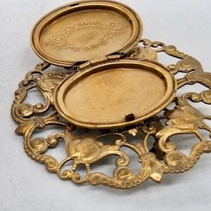 ANTIQUE gold filled brooch, doubles as a locket, lovely filigree. image 2