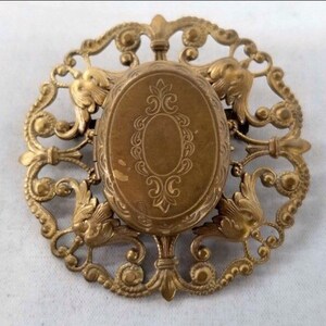 ANTIQUE gold filled brooch, doubles as a locket, lovely filigree. image 1