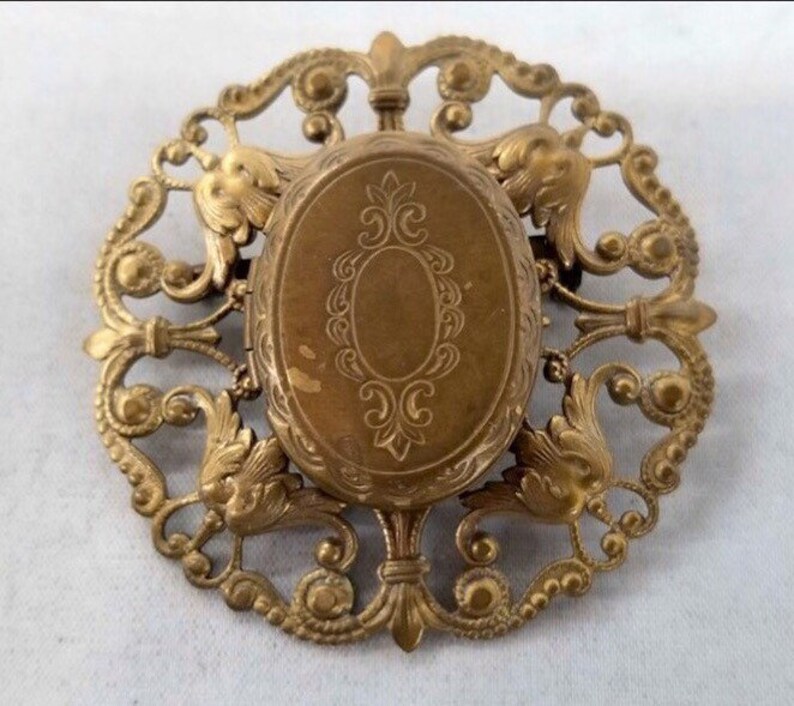 ANTIQUE gold filled brooch, doubles as a locket, lovely filigree. image 1