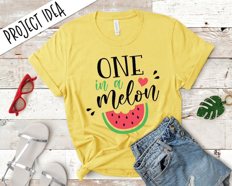 May include: Yellow short-sleeved t-shirt with the text "ONE in a melon" and a watermelon graphic.