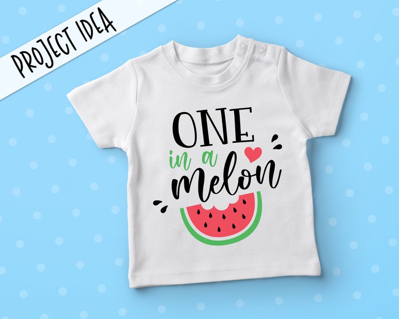 May include: White baby onesie with the text "ONE in a melon" in black script with a red heart and a watermelon graphic.