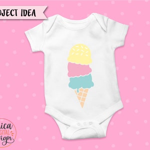 May include: White baby onesie with a colorful ice cream cone design. The ice cream has three scoops: yellow with sprinkles, pink, and blue. The cone is light brown, and the text "PROJECT IDEA" is at the top.