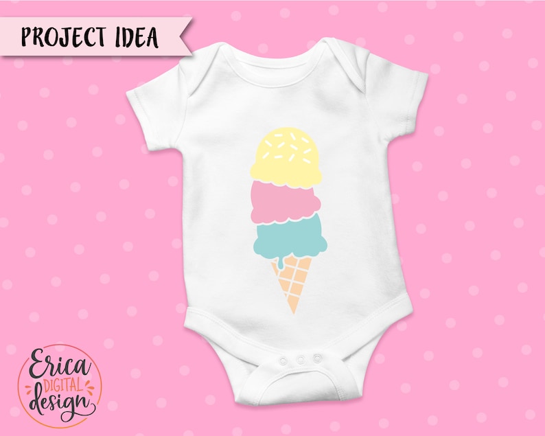 May include: White baby onesie with a colorful ice cream cone design. The ice cream has three scoops: yellow with sprinkles, pink, and blue. The cone is light brown, and the text "PROJECT IDEA" is at the top.