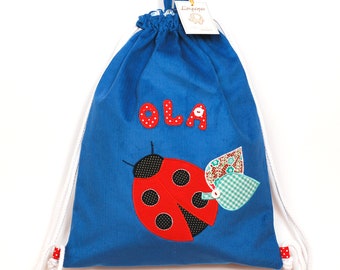 Borsa-zaino blu con la coccinella